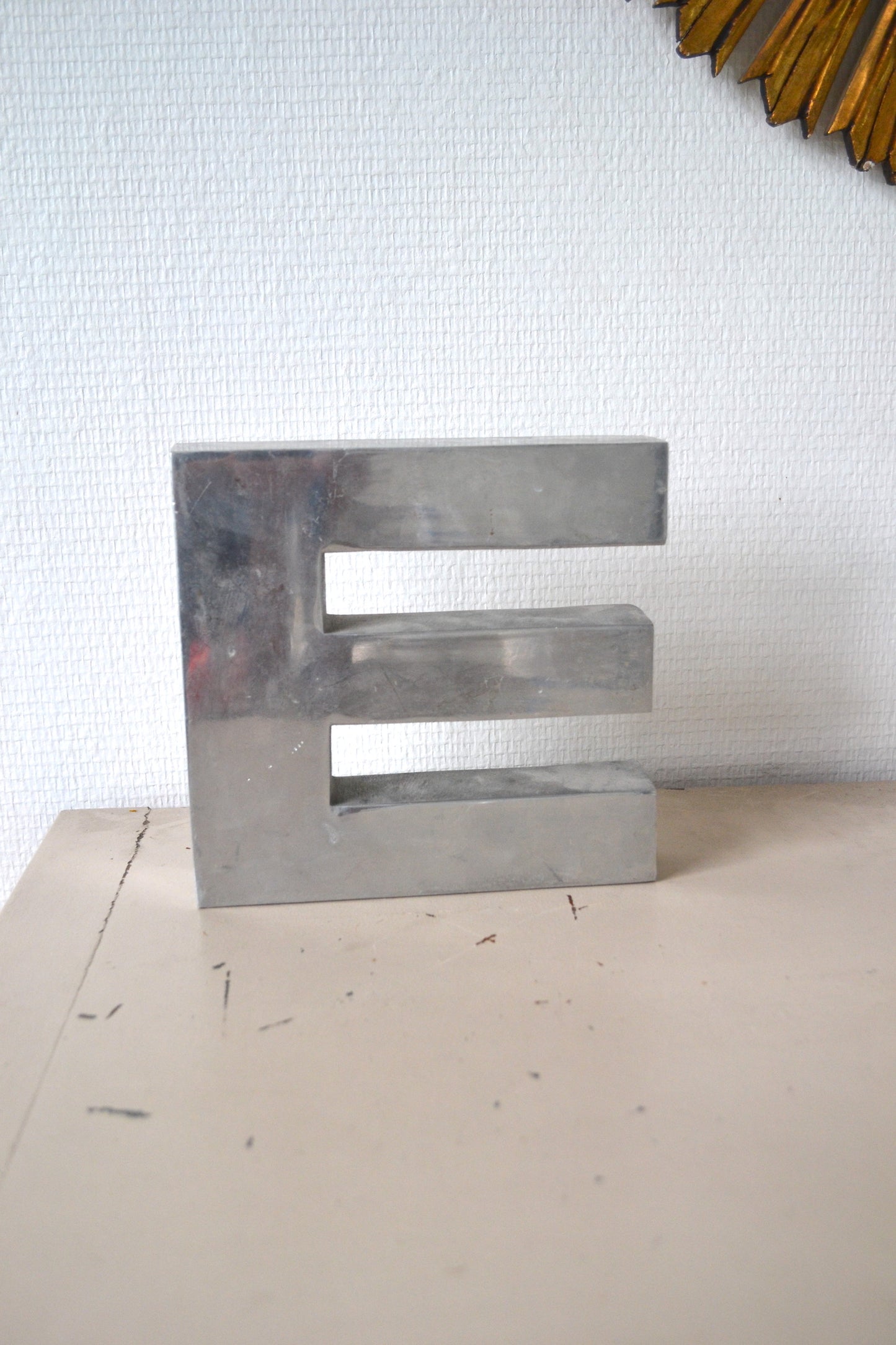Lettre E