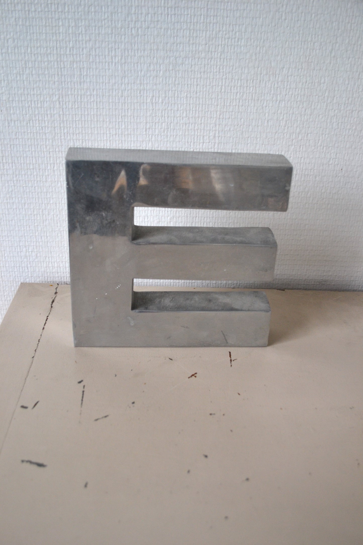 Lettre E