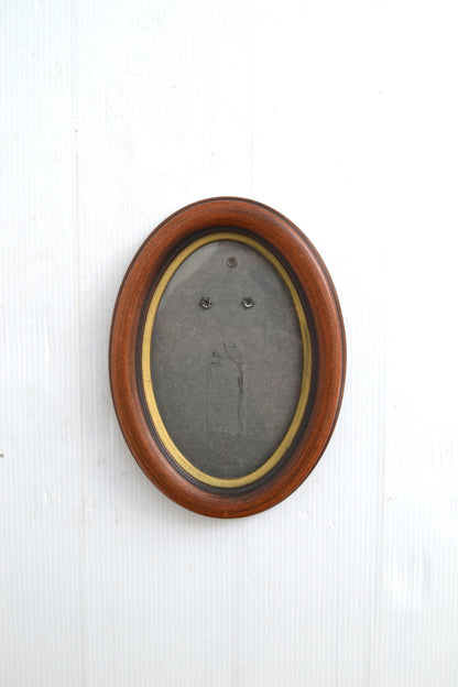 Cadre oval en bois vide
