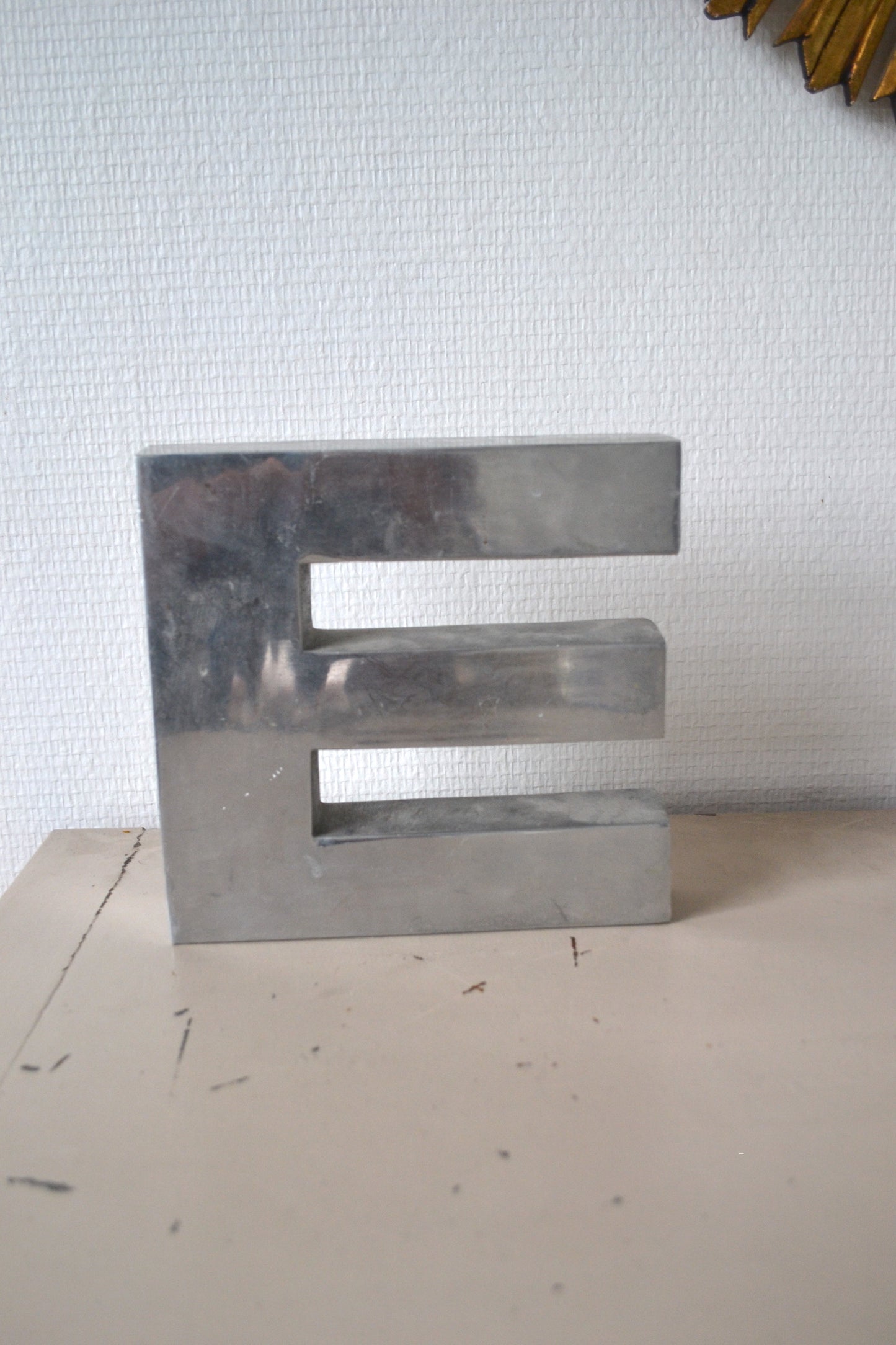 Lettre E