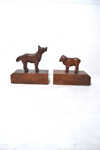 Anciens serre-livres en bois sculpté