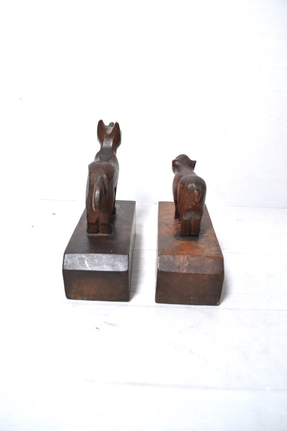 Anciens serre-livres en bois sculpté