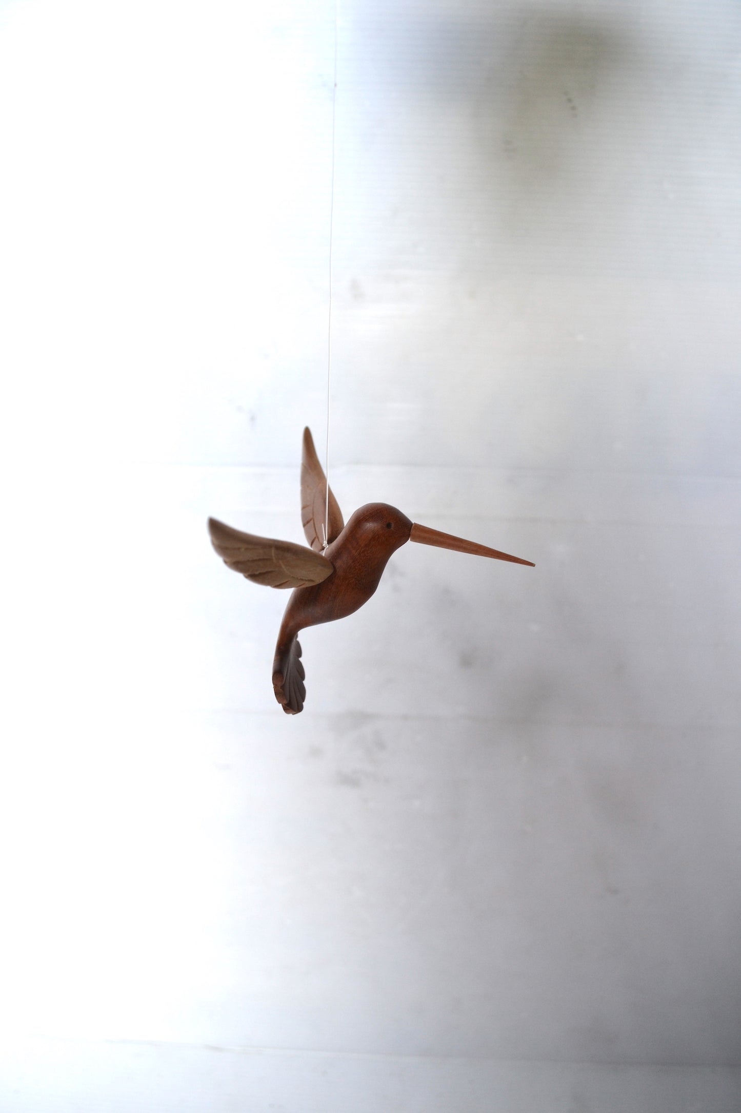 Colibris en bois sculpté