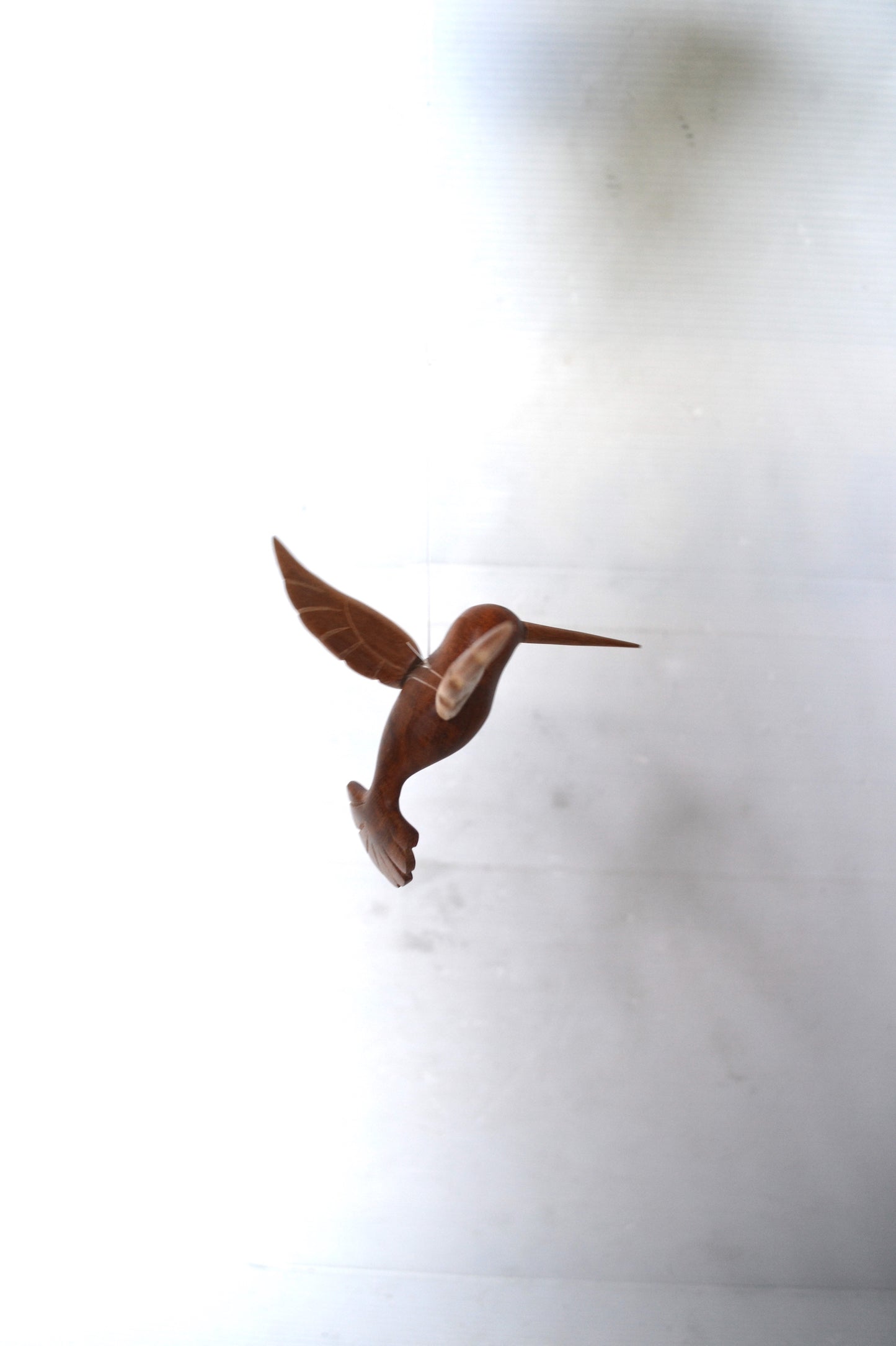 Colibris en bois sculpté