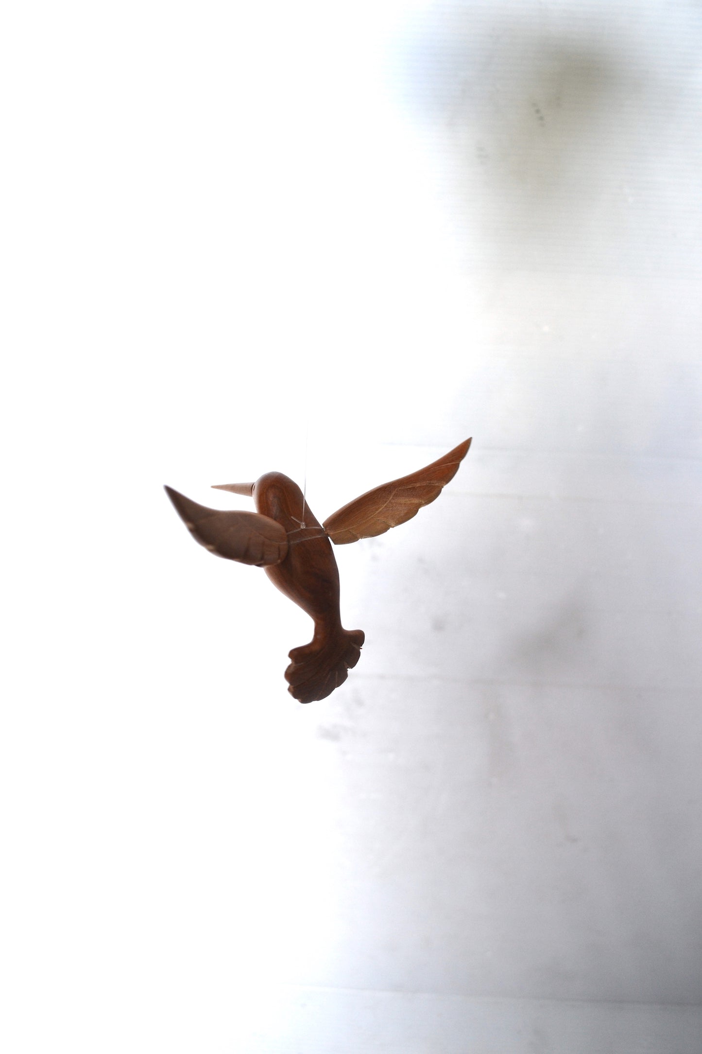 Colibris en bois sculpté