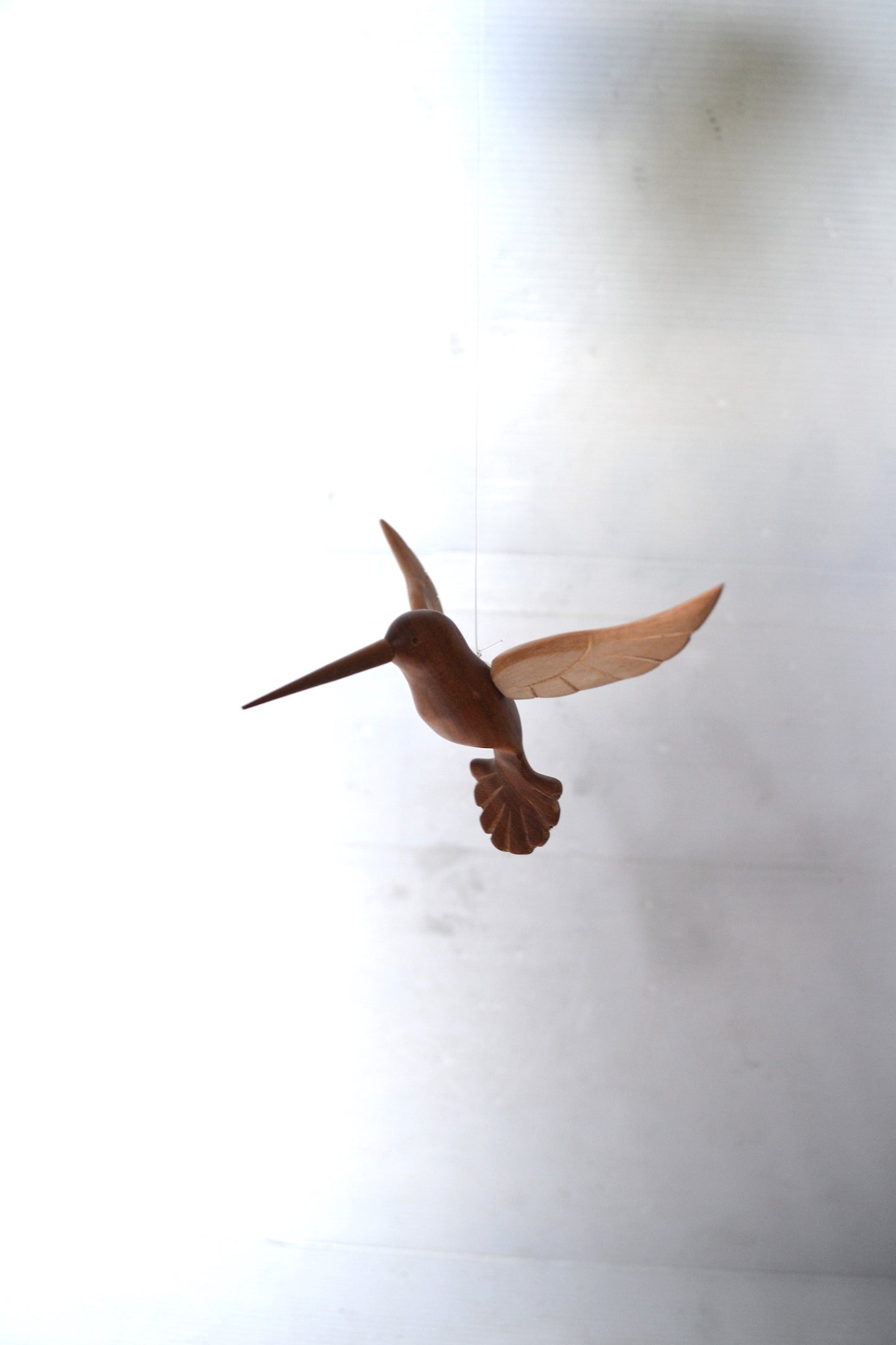 Colibris en bois sculpté