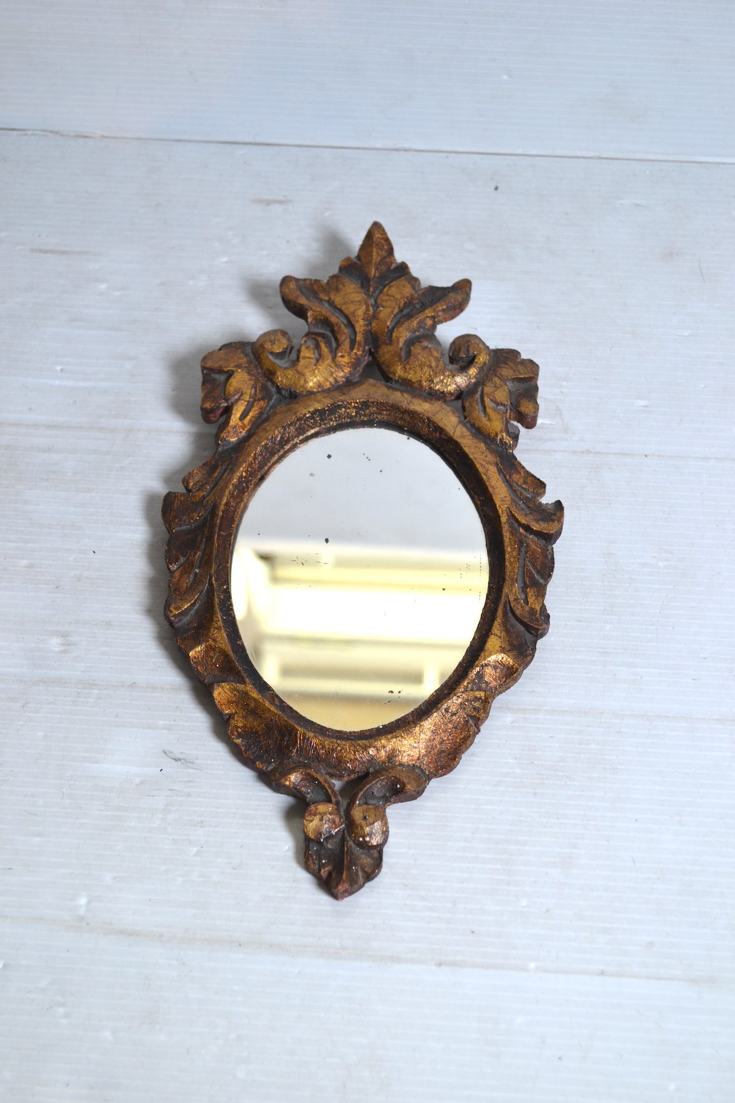 Miroir en bois doré