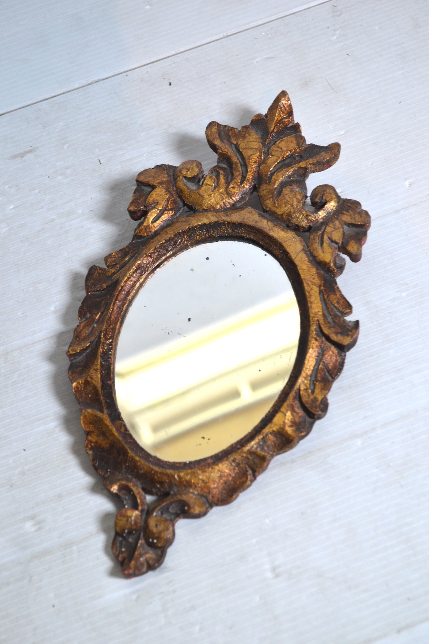Miroir en bois doré