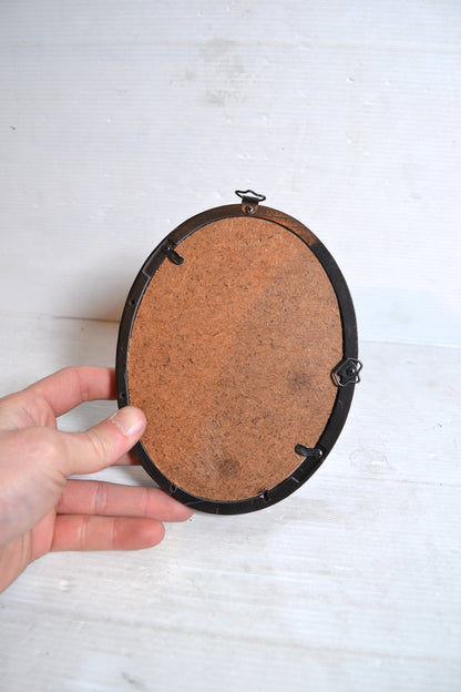 Cadre ovale religieux