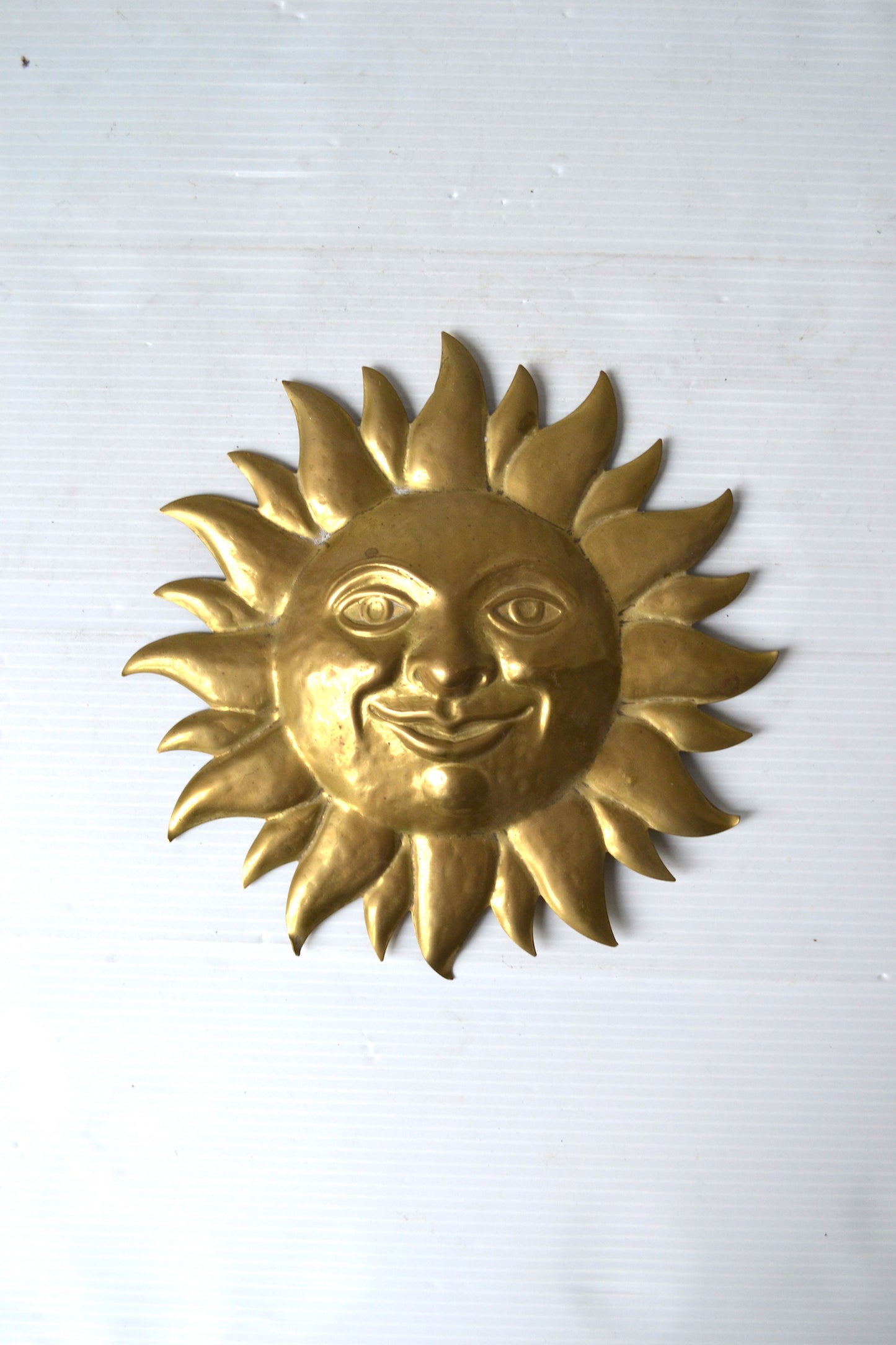 Soleil en laiton
