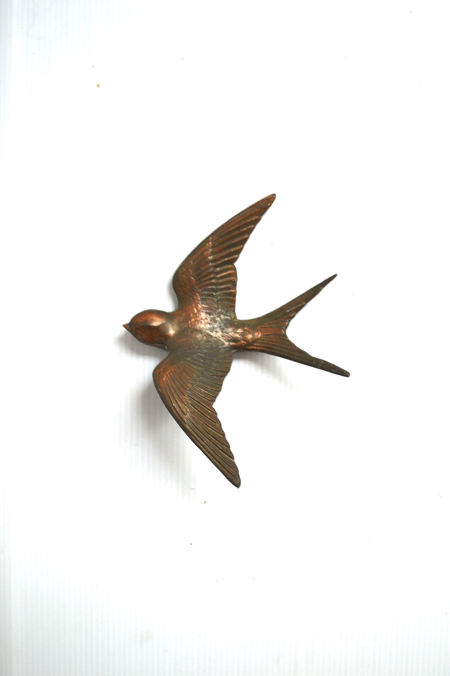 Hirondelle en cuivre