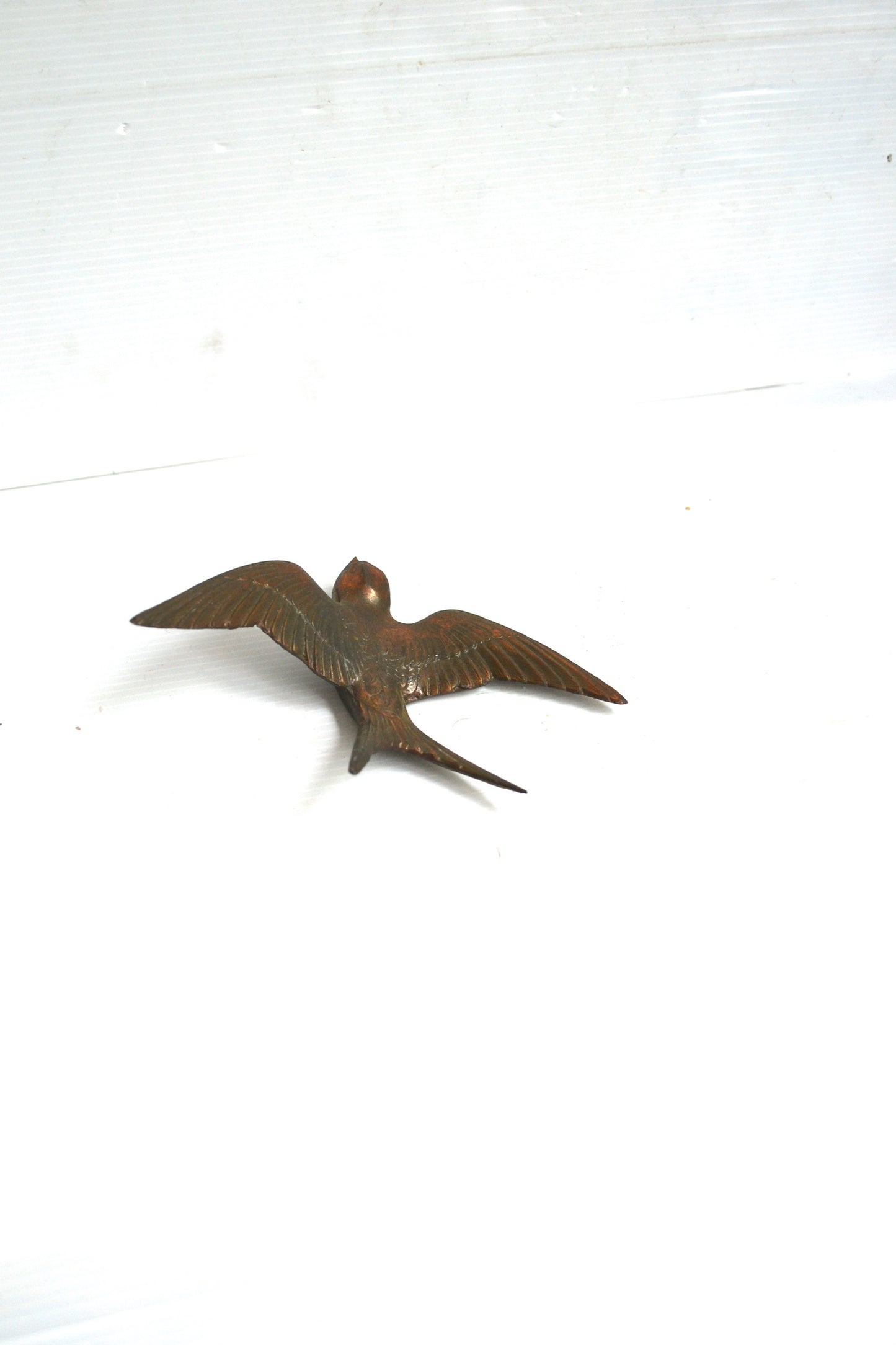Hirondelle en cuivre