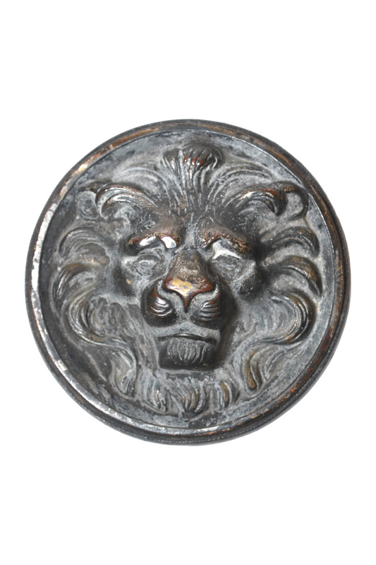 Ancien bouton de porte en forme de tête de lion