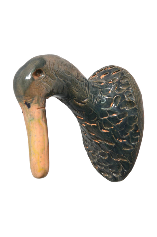 Tête de canard en céramique