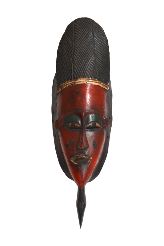 Masque africain en bois sculpté