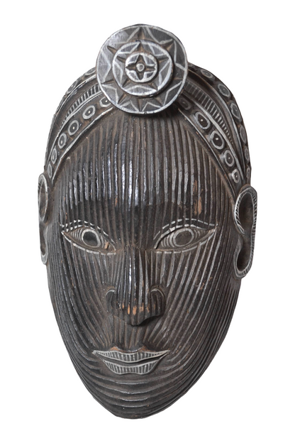 Masque africain en bois sculpté