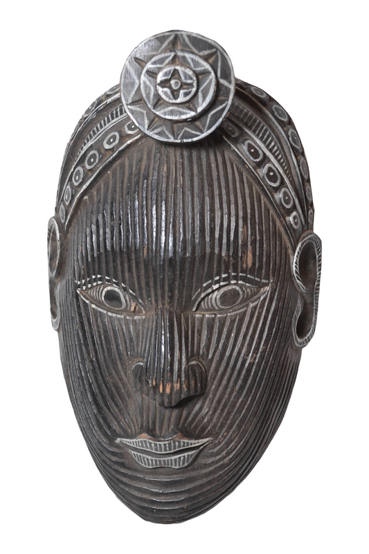Masque africain en bois sculpté