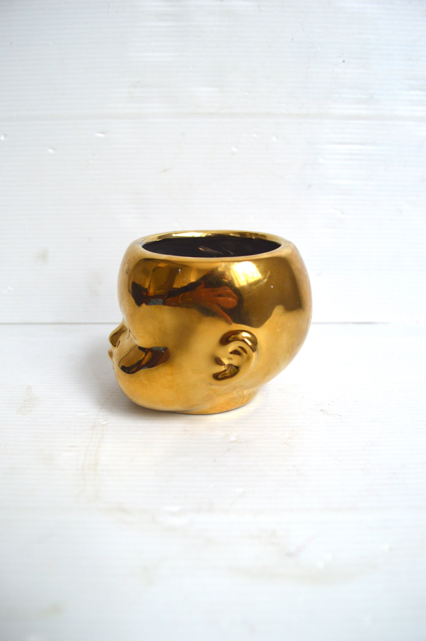 cache-pot-tete