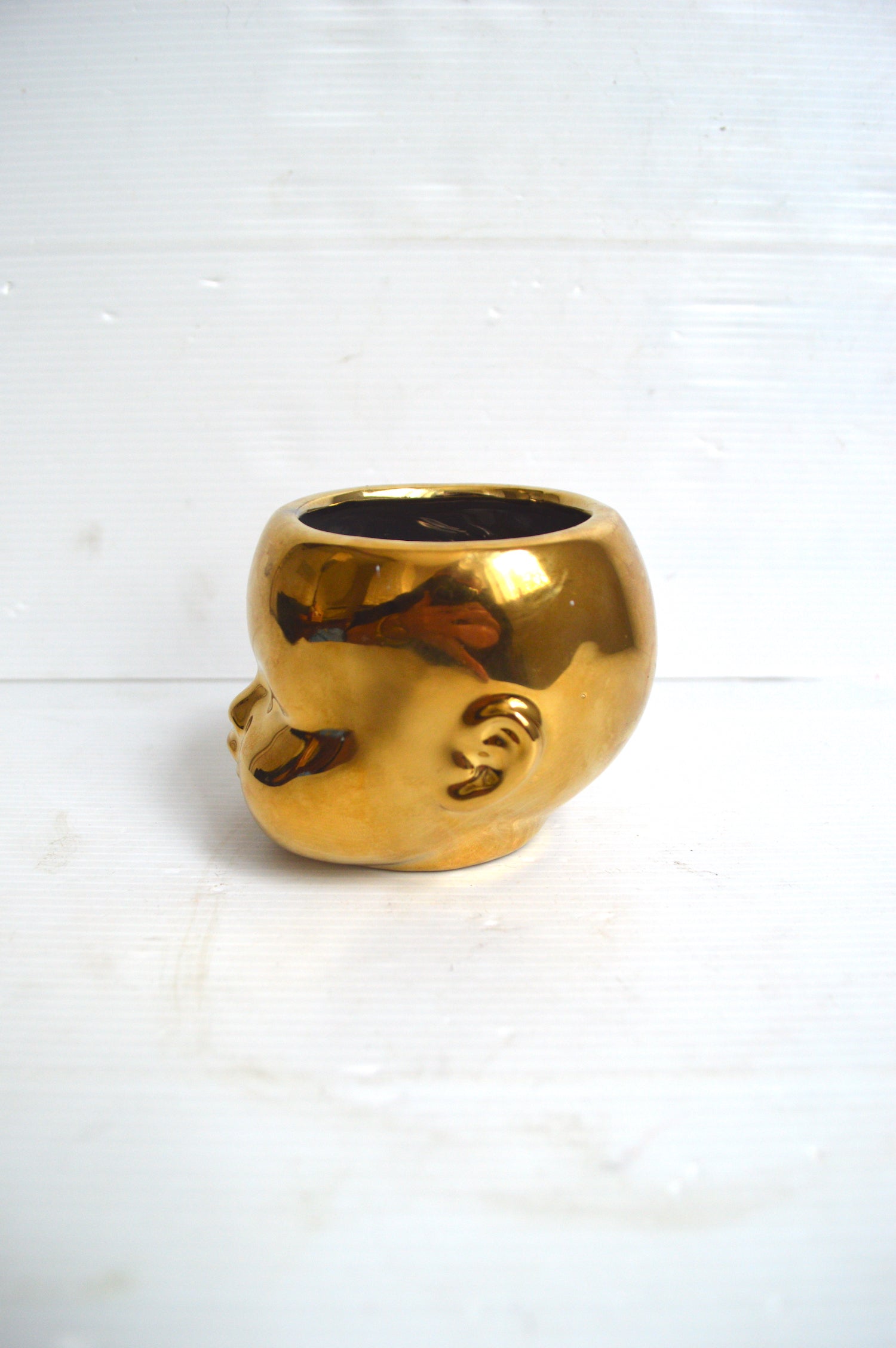cache-pot-tete