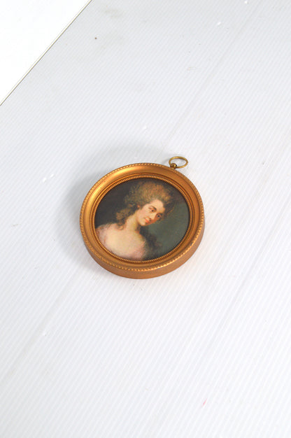 Petit cadre rond doré