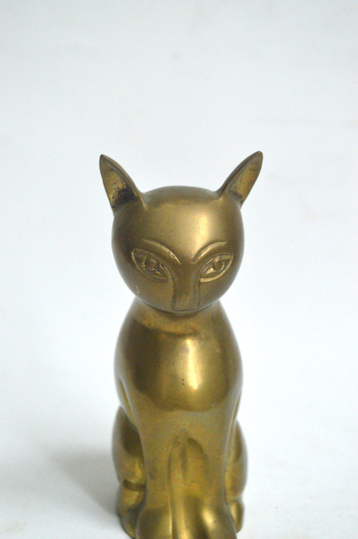 chat décoratif doré