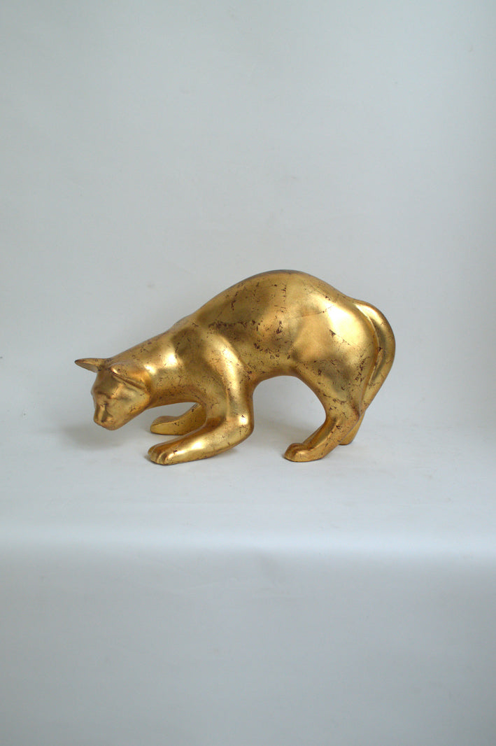 chat en céramique doré