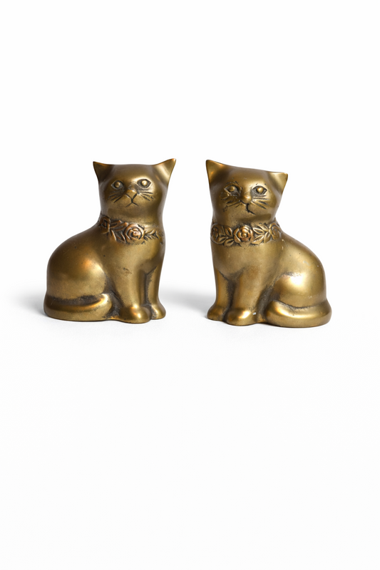 Chats en laiton