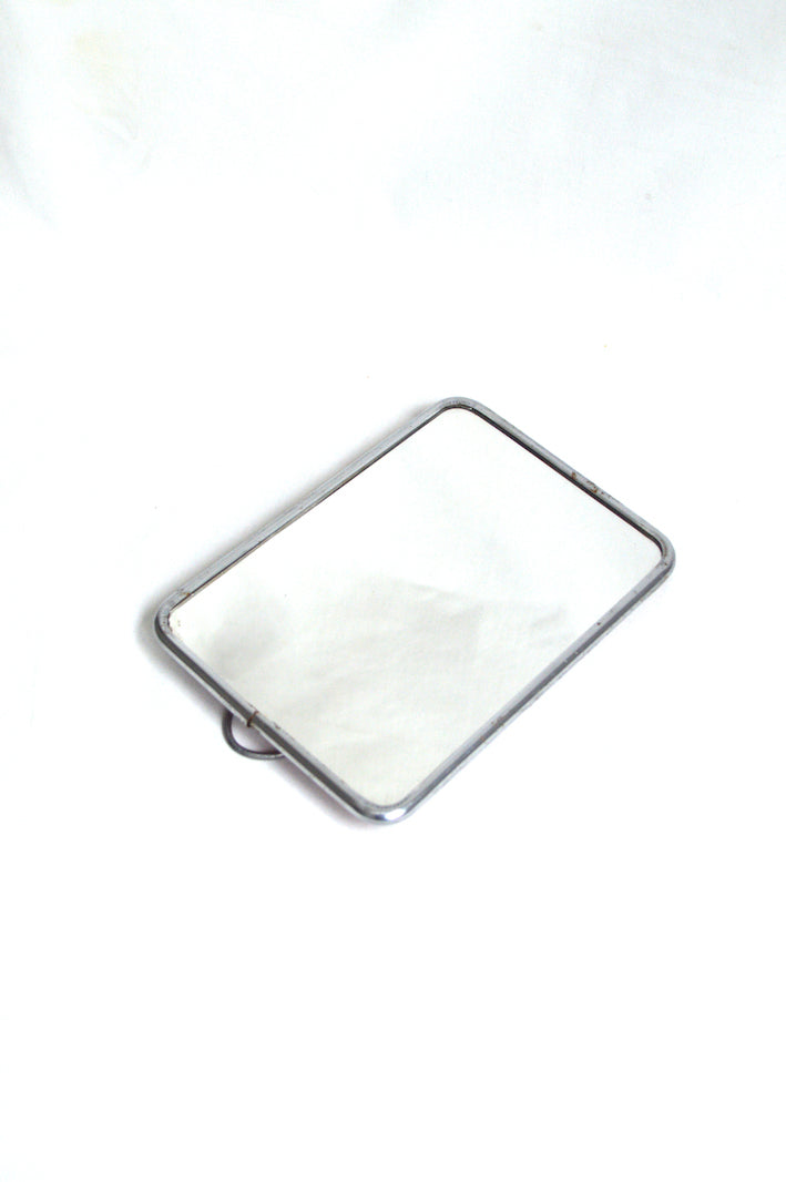 Petit miroir de barbier