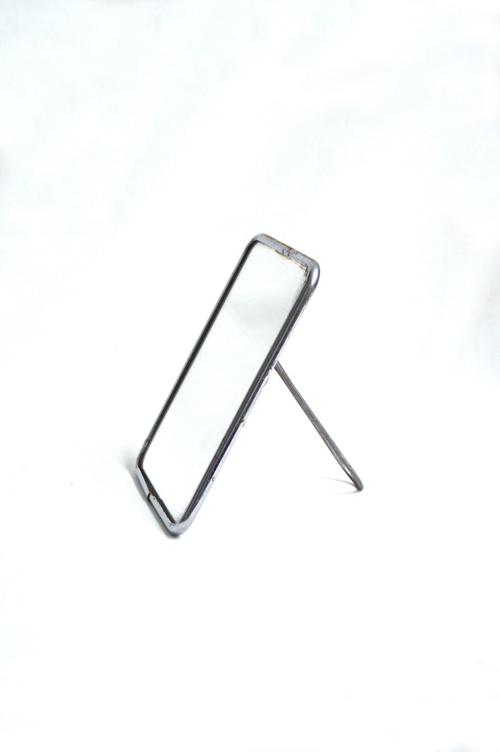 Petit miroir de barbier