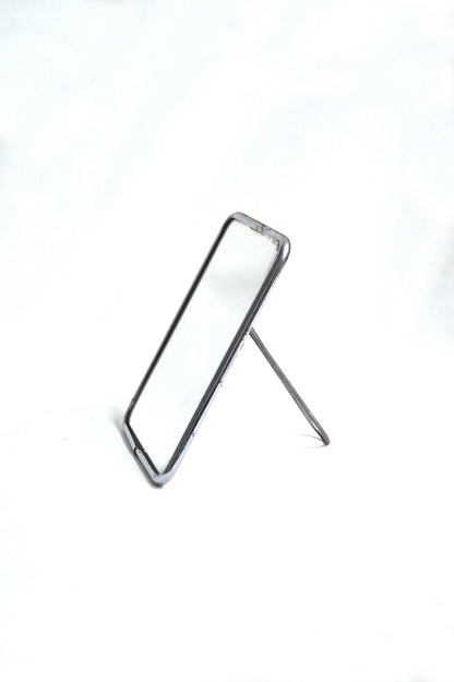Petit miroir de barbier