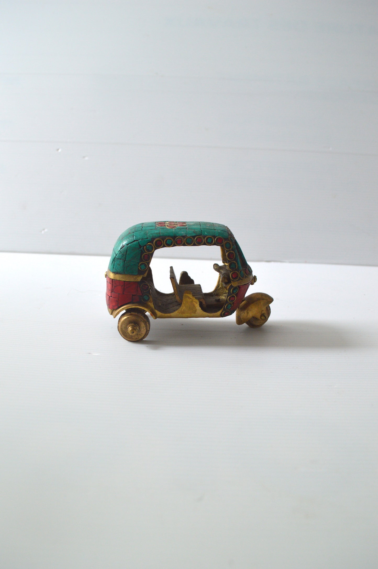 rickshaw-en-laiton