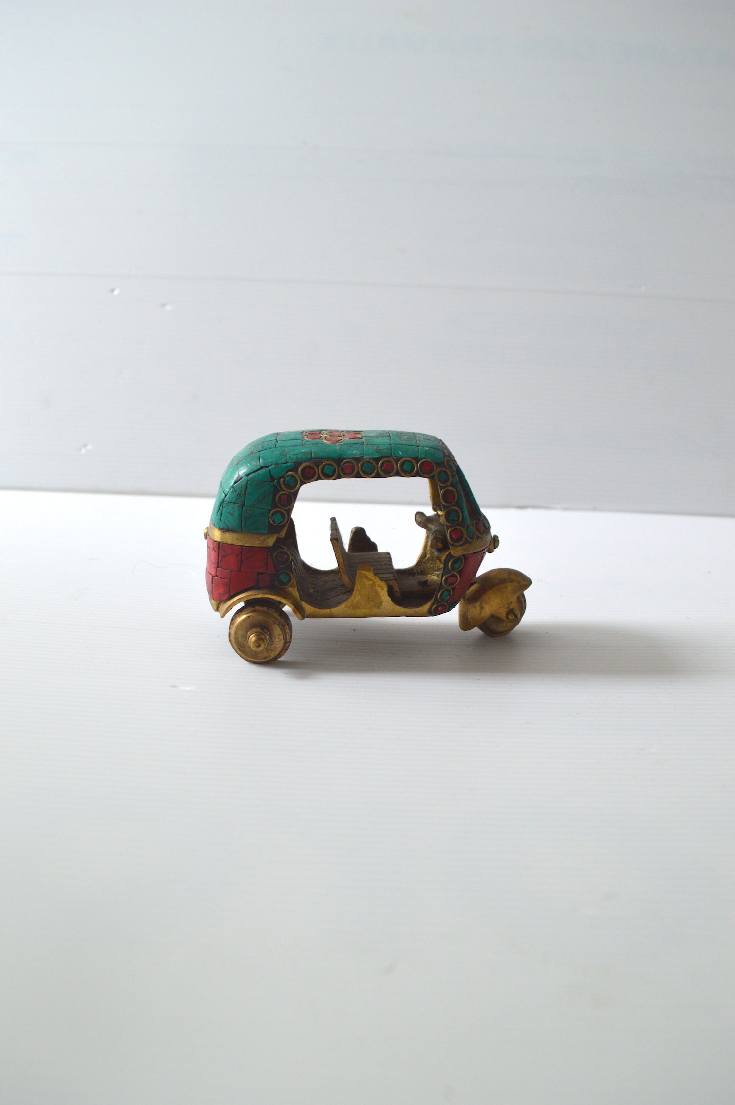 rickshaw-en-laiton