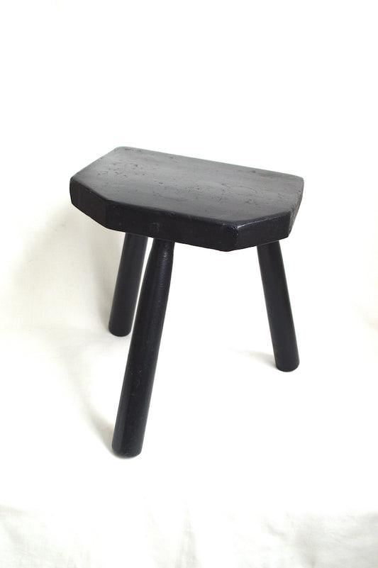 tabouret tripode noir