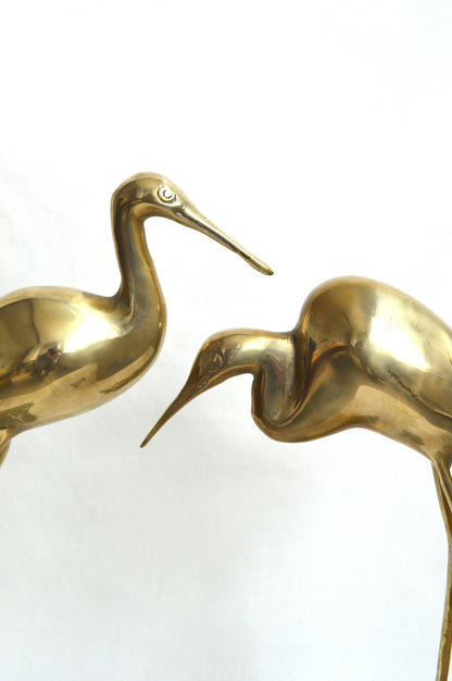 Duo de cigognes en laiton
