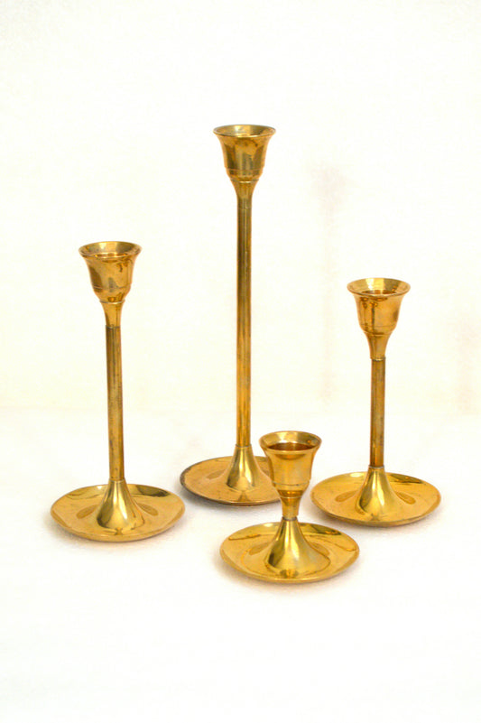 Ensemble de 4 bougeoirs en laiton